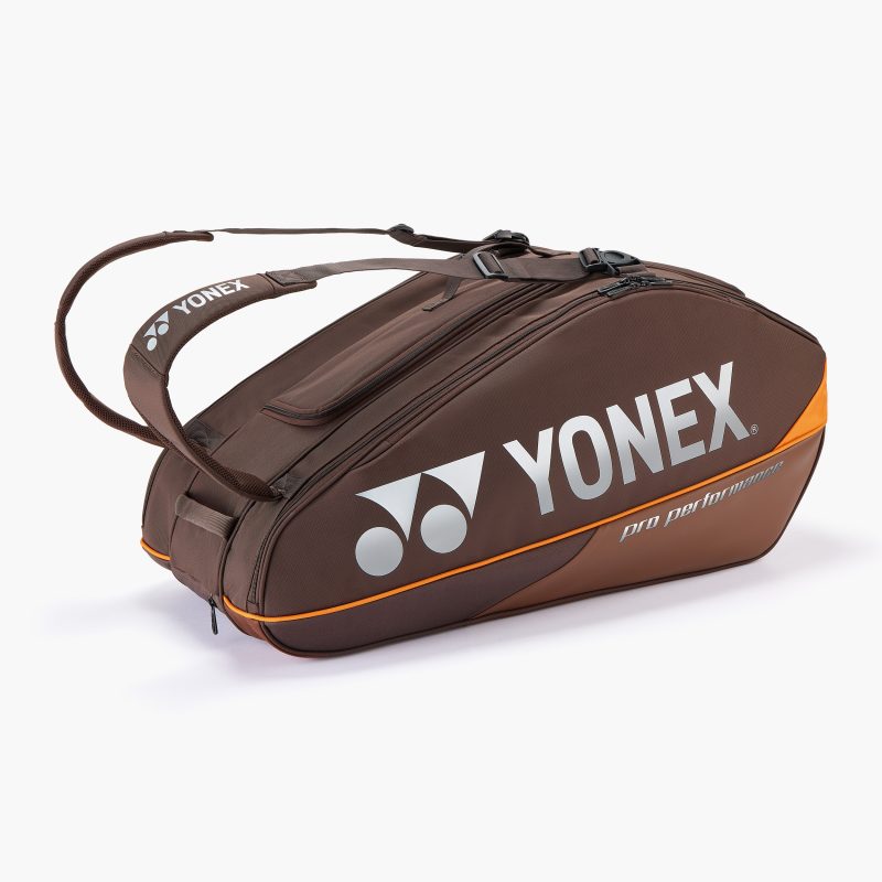 9 racket bag in expresso brown and white with a bit of orange